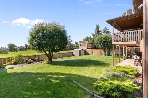39 Coach Gate Way Sw, Calgary, AB - Outdoor With Backyard