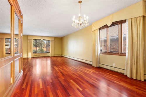 39 Coach Gate Way Sw, Calgary, AB - Indoor Photo Showing Other Room