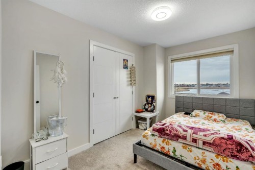 1222 Westmount Drive, Strathmore, AB - Indoor Photo Showing Bedroom