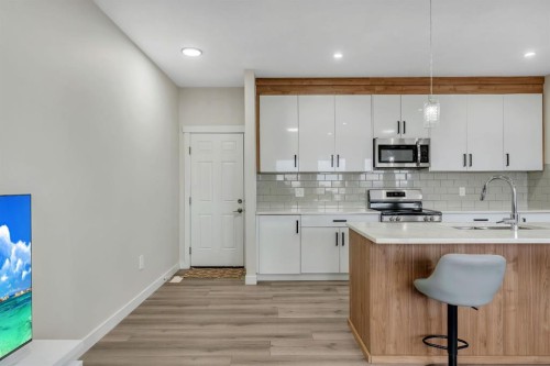 1222 Westmount Drive, Strathmore, AB - Indoor Photo Showing Kitchen With Double Sink With Upgraded Kitchen