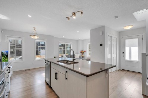 4 Southwinds Gate Sw, Airdrie, AB - Indoor Photo Showing Kitchen With Double Sink