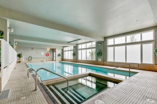 417-15 Everstone Drive Sw, Calgary, AB - Indoor Photo Showing Other Room With In Ground Pool
