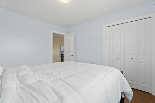 113 Aspen Stone Place Sw, Calgary, AB - Indoor Photo Showing Bedroom