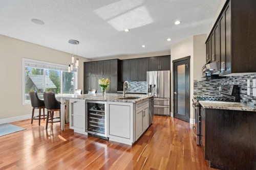 113 Aspen Stone Place Sw, Calgary, AB - Indoor Photo Showing Kitchen With Upgraded Kitchen