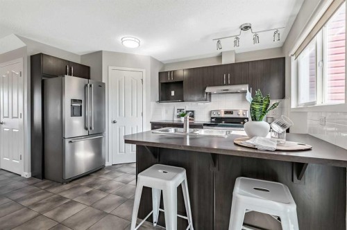 6 Autumn Green Se, Calgary, AB - Indoor Photo Showing Kitchen With Stainless Steel Kitchen With Double Sink