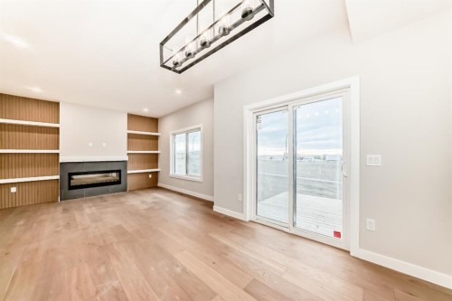 508 Heritage Boulevard, Cochrane, AB - Indoor With Fireplace