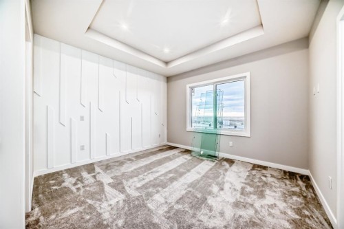 508 Heritage Boulevard, Cochrane, AB - Indoor Photo Showing Other Room