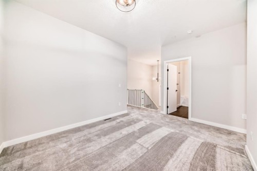 508 Heritage Boulevard, Cochrane, AB - Indoor Photo Showing Other Room