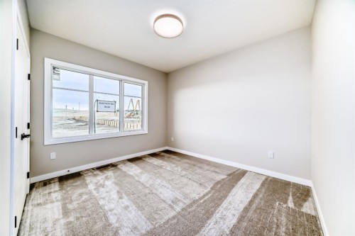 508 Heritage Boulevard, Cochrane, AB - Indoor Photo Showing Other Room