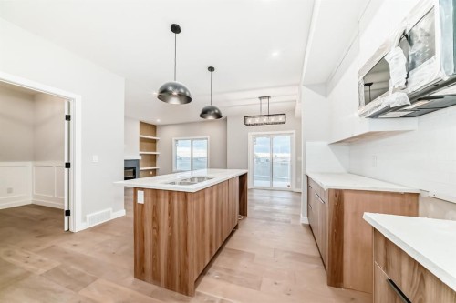 508 Heritage Boulevard, Cochrane, AB - Indoor Photo Showing Kitchen