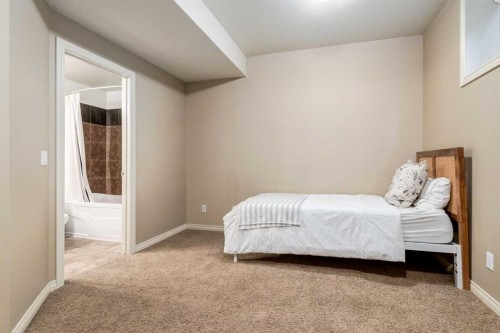 1-2413 2 Avenue Nw, Calgary, AB - Indoor Photo Showing Bedroom