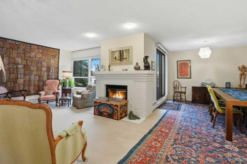 225-2425 90 Avenue Sw, Calgary, AB - Indoor With Fireplace