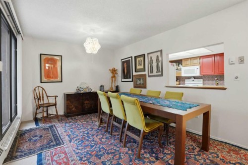 225-2425 90 Avenue Sw, Calgary, AB - Indoor Photo Showing Dining Room