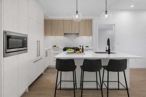 306-8375 Broadcast Avenue, Calgary, AB - Indoor Photo Showing Kitchen With Upgraded Kitchen