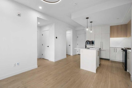 306-8375 Broadcast Avenue, Calgary, AB - Indoor Photo Showing Kitchen With Upgraded Kitchen