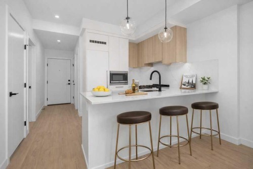 409-8375 Broadcast Avenue, Calgary, AB - Indoor Photo Showing Kitchen