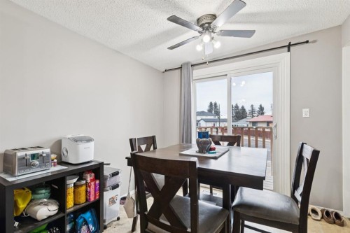 157 Penbrooke Close Se, Calgary, AB - Indoor Photo Showing Dining Room