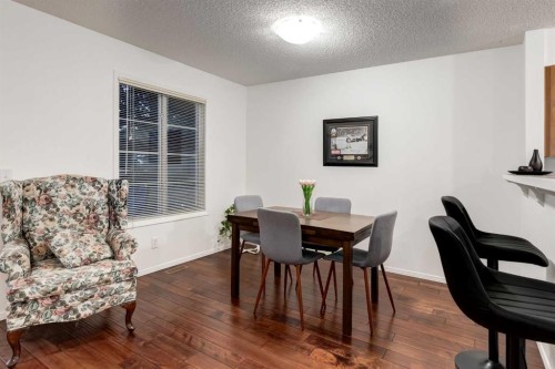 142 Eversyde Common Sw, Calgary, AB - Indoor Photo Showing Dining Room