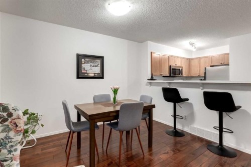142 Eversyde Common Sw, Calgary, AB - Indoor Photo Showing Dining Room