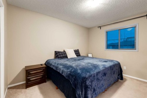 142 Eversyde Common Sw, Calgary, AB - Indoor Photo Showing Bedroom