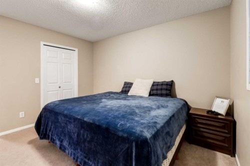 142 Eversyde Common Sw, Calgary, AB - Indoor Photo Showing Bedroom