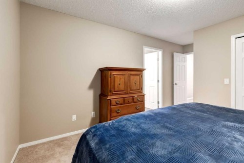 142 Eversyde Common Sw, Calgary, AB - Indoor Photo Showing Bedroom