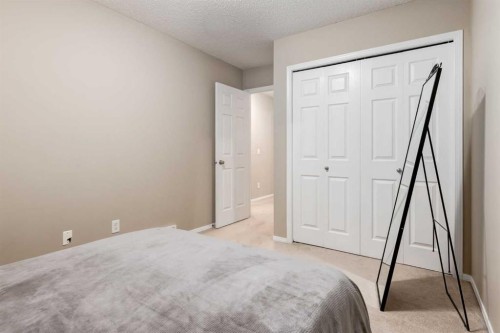 142 Eversyde Common Sw, Calgary, AB - Indoor Photo Showing Bedroom
