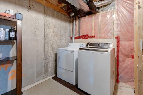 142 Eversyde Common Sw, Calgary, AB - Indoor Photo Showing Laundry Room