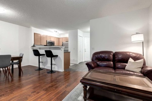 142 Eversyde Common Sw, Calgary, AB - Indoor Photo Showing Living Room