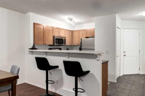 142 Eversyde Common Sw, Calgary, AB - Indoor Photo Showing Kitchen