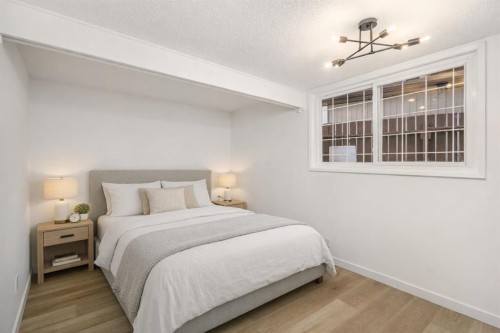 15 A Arlington Bay Se, Calgary, AB - Indoor Photo Showing Bedroom