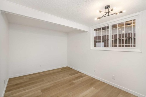 15 A Arlington Bay Se, Calgary, AB - Indoor Photo Showing Other Room