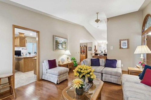 1025 Shawnee Road Sw, Calgary, AB - Indoor Photo Showing Living Room