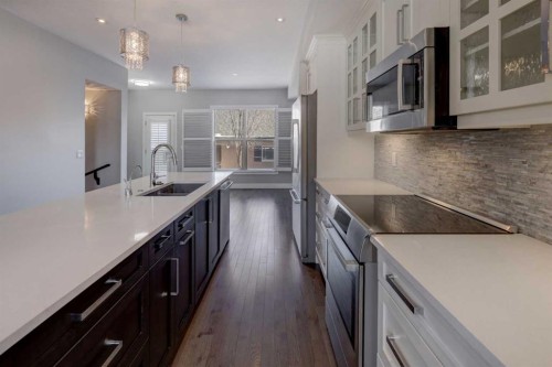42 Sage Meadows Terrace Nw, Calgary, AB - Indoor Photo Showing Kitchen With Double Sink With Upgraded Kitchen