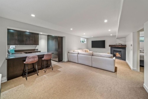 39 Wentworth Manor Sw, Calgary, AB - Indoor With Fireplace