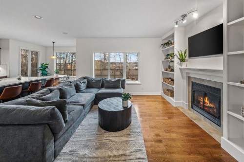 39 Wentworth Manor Sw, Calgary, AB - Indoor Photo Showing Living Room With Fireplace