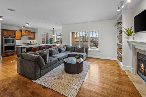 39 Wentworth Manor Sw, Calgary, AB - Indoor Photo Showing Living Room With Fireplace