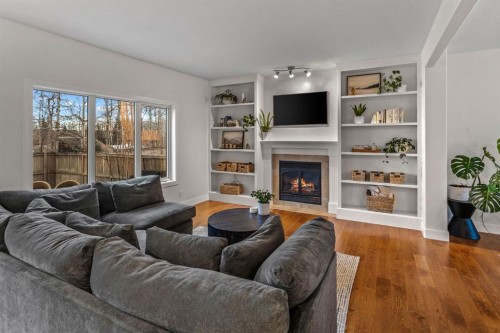 39 Wentworth Manor Sw, Calgary, AB - Indoor Photo Showing Living Room With Fireplace