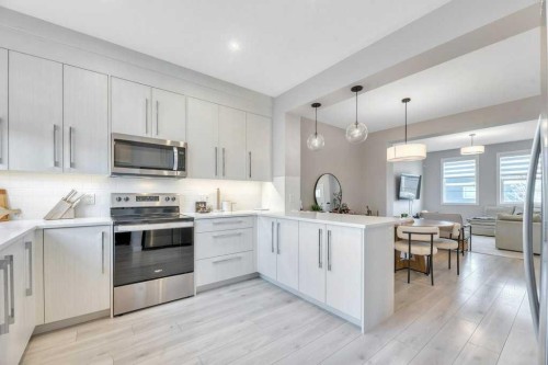 121 Dawson Circle, Chestermere, AB - Indoor Photo Showing Kitchen With Upgraded Kitchen