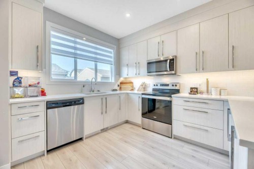 121 Dawson Circle, Chestermere, AB - Indoor Photo Showing Kitchen With Upgraded Kitchen