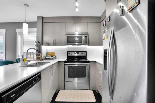 6415-302 Skyview Ranch Drive Ne, Calgary, AB - Indoor Photo Showing Kitchen With Stainless Steel Kitchen With Double Sink With Upgraded Kitchen