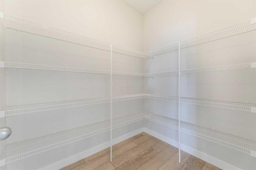 747 Creekside Boulevard Sw, Calgary, AB - Indoor With Storage