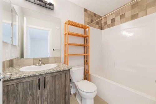 747 Creekside Boulevard Sw, Calgary, AB - Indoor Photo Showing Bathroom