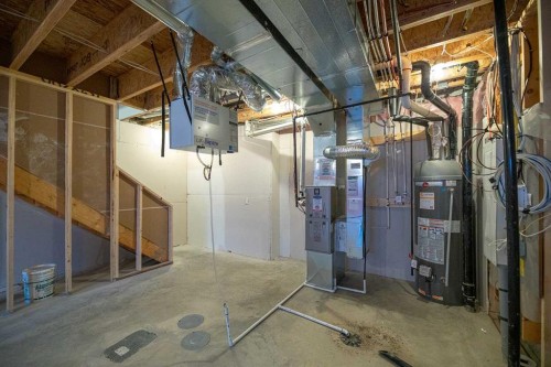 747 Creekside Boulevard Sw, Calgary, AB - Indoor Photo Showing Basement