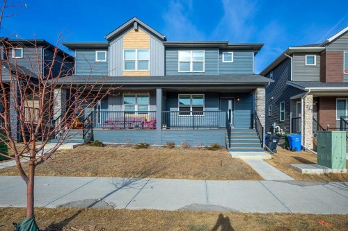 747 Creekside Boulevard Sw, Calgary, AB - Outdoor With Deck Patio Veranda With Facade