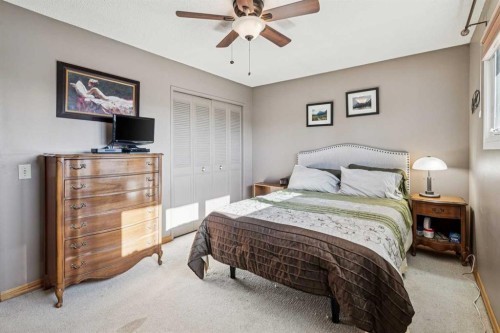 256 Huntridge Road Ne, Calgary, AB - Indoor Photo Showing Bedroom