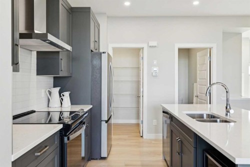 438 South Shore Drive, Chestermere, AB - Indoor Photo Showing Kitchen With Double Sink With Upgraded Kitchen