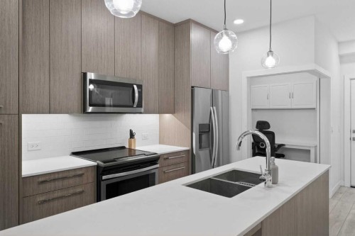 2408-76 Cornerstone Passage Ne, Calgary, AB - Indoor Photo Showing Kitchen With Stainless Steel Kitchen With Double Sink With Upgraded Kitchen