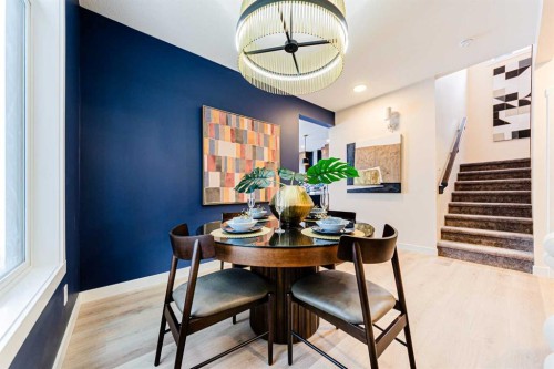 691 Buffaloberry Manor Se, Calgary, AB - Indoor Photo Showing Dining Room