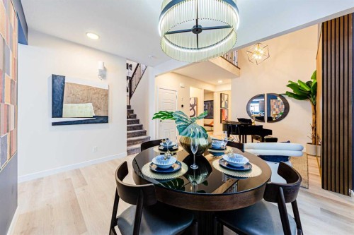 691 Buffaloberry Manor Se, Calgary, AB - Indoor Photo Showing Dining Room